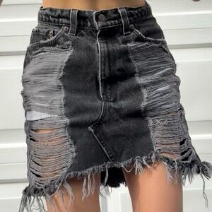 Vintage black denim skirt , reworked and sold by “Furst of a Kind” at LF